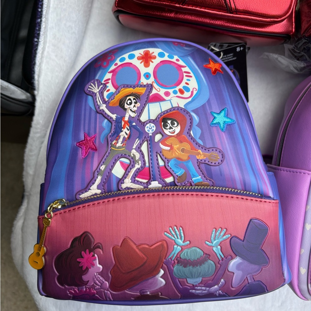 Loungefly Purple and Pink Skeleton Backpack